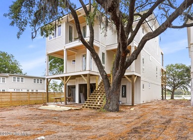 Welcome to coastal living at its absolute finest in highly - photo 4