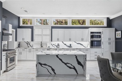 This 7-bedroom, 10-bathroom mini mansion is located in an - photo 15