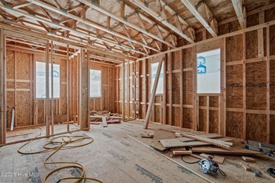 Just two blocks from the Atlantic Ocean in walkable Kure Beach