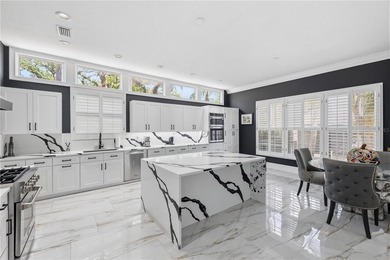 This 7-bedroom, 10-bathroom mini mansion is located in an - photo 17