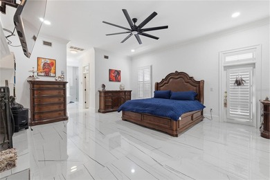This 7-bedroom, 10-bathroom mini mansion is located in an - photo 19