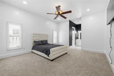 This 7-bedroom, 10-bathroom mini mansion is located in an - photo 28