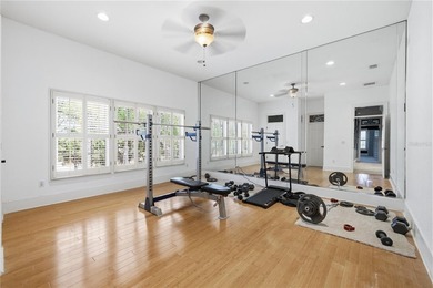 This 7-bedroom, 10-bathroom mini mansion is located in an - photo 29