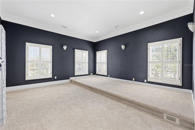 This 7-bedroom, 10-bathroom mini mansion is located in an - photo 30