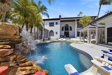 This 7-bedroom, 10-bathroom mini mansion is located in an - photo 34