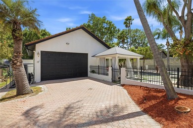 This 7-bedroom, 10-bathroom mini mansion is located in an - photo 38