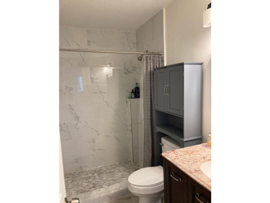 WELCOME TO THIS BEAUTIFULLY UPDATED 2 BEDROOM, 2 BATH VILLA IN - photo 12