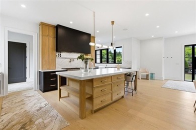 Nestled on 1.34 beautifully landscaped and fully fenced acres in - photo 14