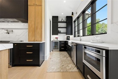 Nestled on 1.34 beautifully landscaped and fully fenced acres in - photo 16