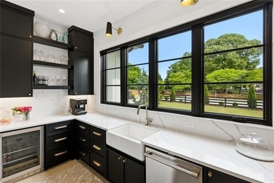 Nestled on 1.34 beautifully landscaped and fully fenced acres in - photo 18