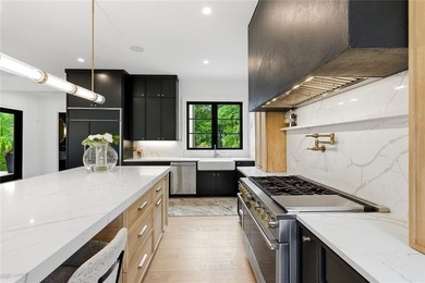 Nestled on 1.34 beautifully landscaped and fully fenced acres in - photo 21