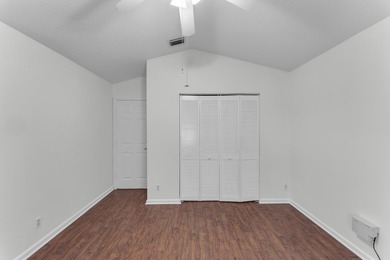 Move right into 3/2/2 in gated River Bridge. Newly painted, Roof - photo 21