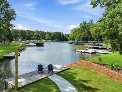Completely remodeled from top to bottom, this lakefront home is - photo 3