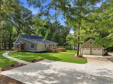 Completely remodeled from top to bottom, this lakefront home is - photo 7