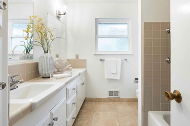 Set on a peaceful cul-de-sac, this inviting home pairs beautiful - photo 13