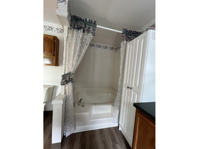Welcome to this 2-bedroom, 2-bath double-wide located in the - photo 15