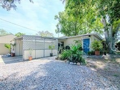 Discover a unique opportunity in Gulfport: this 4-bedroom - photo 3