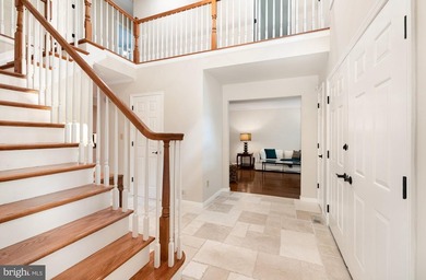 Tucked away on five private acres with a stream that feeds into - photo 5