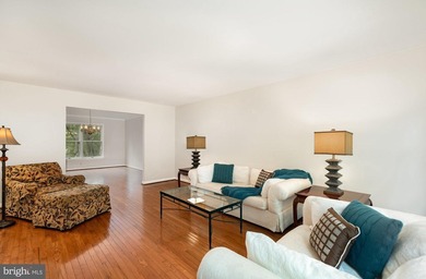 Tucked away on five private acres with a stream that feeds into - photo 8