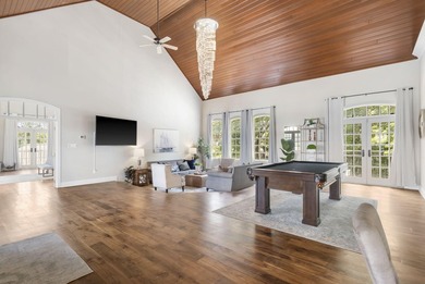 Located on approximately 1.5 gated lakefront acres just off - photo 18