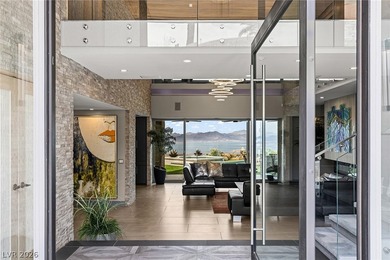 Perched on a prime .52 acre hillside estate overlooking Lake - photo 19