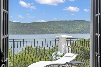 Located on approximately 1.5 gated lakefront acres just off - photo 27
