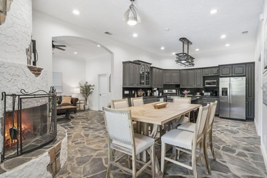 Located on approximately 1.5 gated lakefront acres just off - photo 32