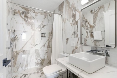 Located on approximately 1.5 gated lakefront acres just off - photo 36