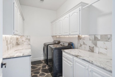 Located on approximately 1.5 gated lakefront acres just off - photo 46