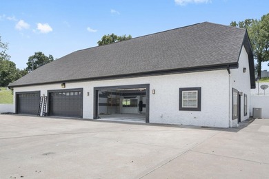 Located on approximately 1.5 gated lakefront acres just off - photo 49