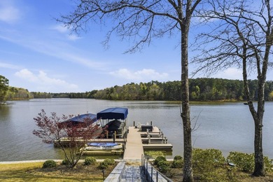 Set directly on Lake Oconee inside the gated community of - photo 2