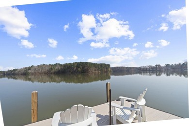 Set directly on Lake Oconee inside the gated community of - photo 3