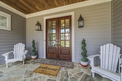 Set directly on Lake Oconee inside the gated community of - photo 5