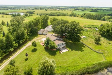 Located just outside Indianola city limits, this ranch sits on - photo 1