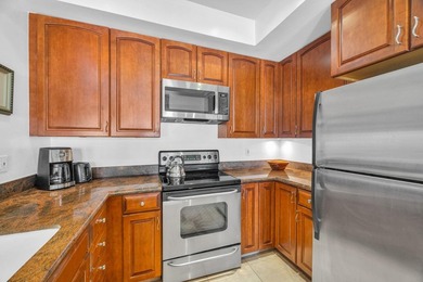 Ocean and fairway views from this beautifully upgraded unit with - photo 15