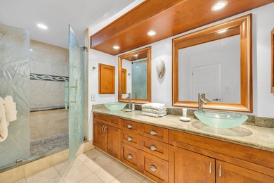 Ocean and fairway views from this beautifully upgraded unit with - photo 16
