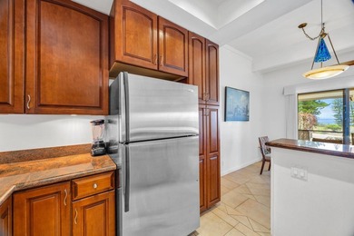 Ocean and fairway views from this beautifully upgraded unit with - photo 18