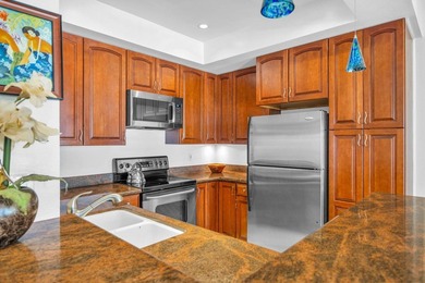 Ocean and fairway views from this beautifully upgraded unit with - photo 19