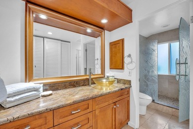 Ocean and fairway views from this beautifully upgraded unit with - photo 32
