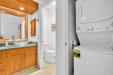 Ocean and fairway views from this beautifully upgraded unit with - photo 36