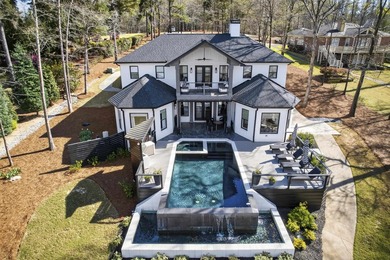 Welcome to this stunning lakefront home in the gated community - photo 3