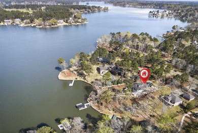 Welcome to this stunning lakefront home in the gated community - photo 4