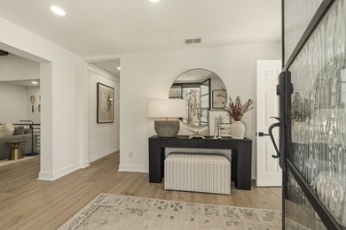 Welcome to this stunning lakefront home in the gated community - photo 7