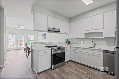 Panoramic Gulf views meet timeless coastal design. Poised within - photo 11