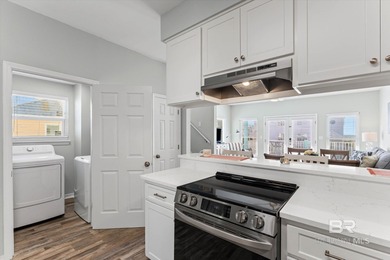 Panoramic Gulf views meet timeless coastal design. Poised within - photo 13
