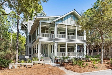 This stunning custom home in WaterColor is a masterful blend of - photo 1