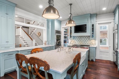 This stunning custom home in WaterColor is a masterful blend of - photo 8