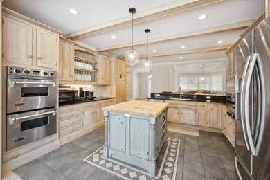 Set beside a 51-acre reserve and moments from the bay, this - photo 8