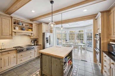 Set beside a 51-acre reserve and moments from the bay, this - photo 9