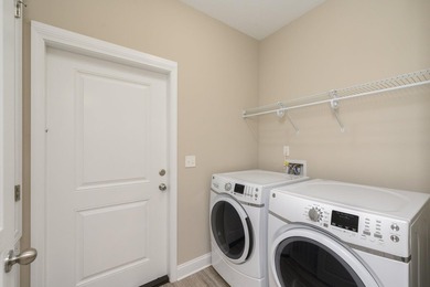 As you step inside, you are greeted with an open floor plan that - photo 31